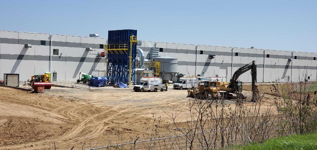 Installation of a dust collection system at a roofing manufacturing company