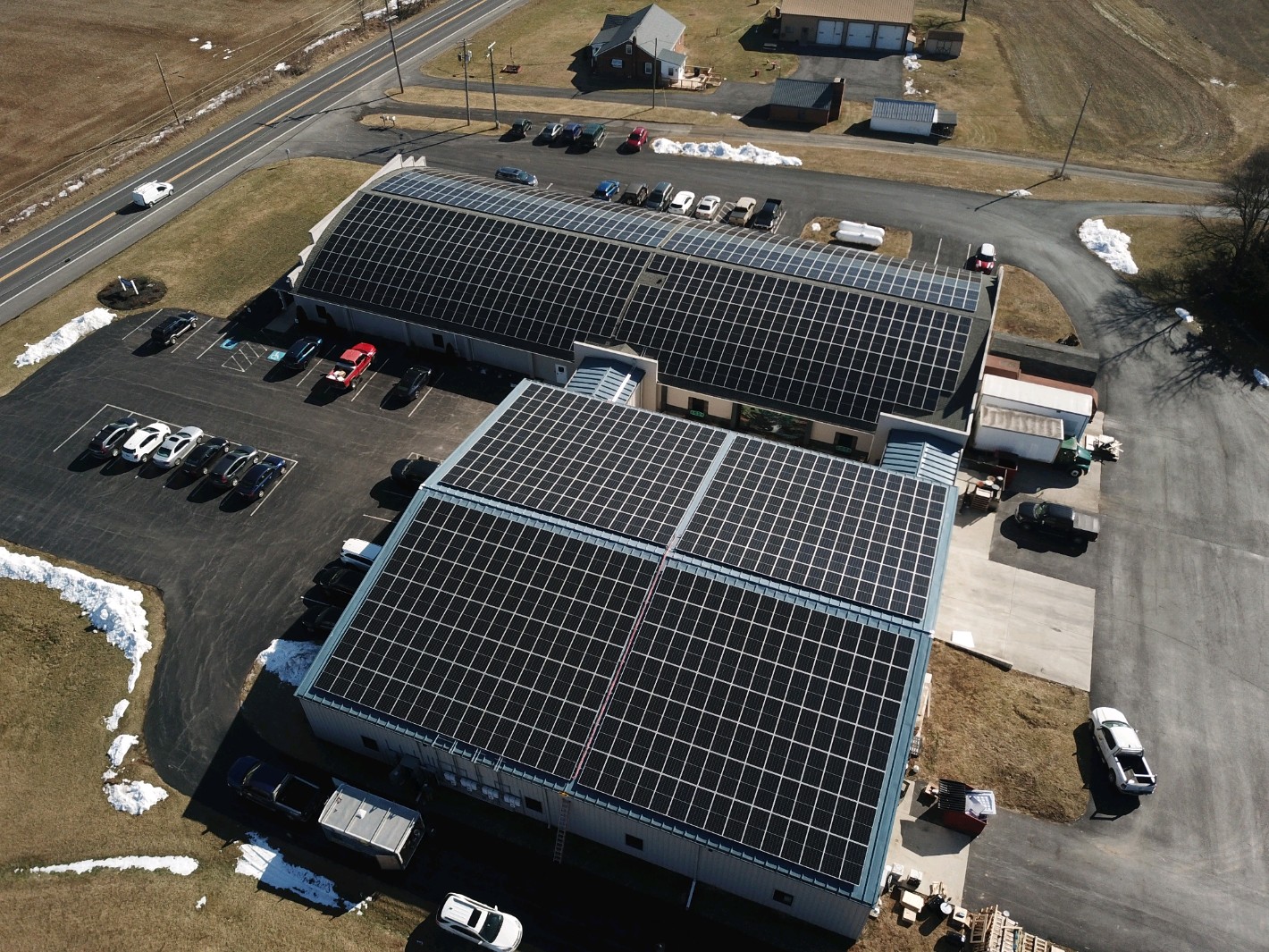 Electrical control panels for facilities with solar-to-grid connections