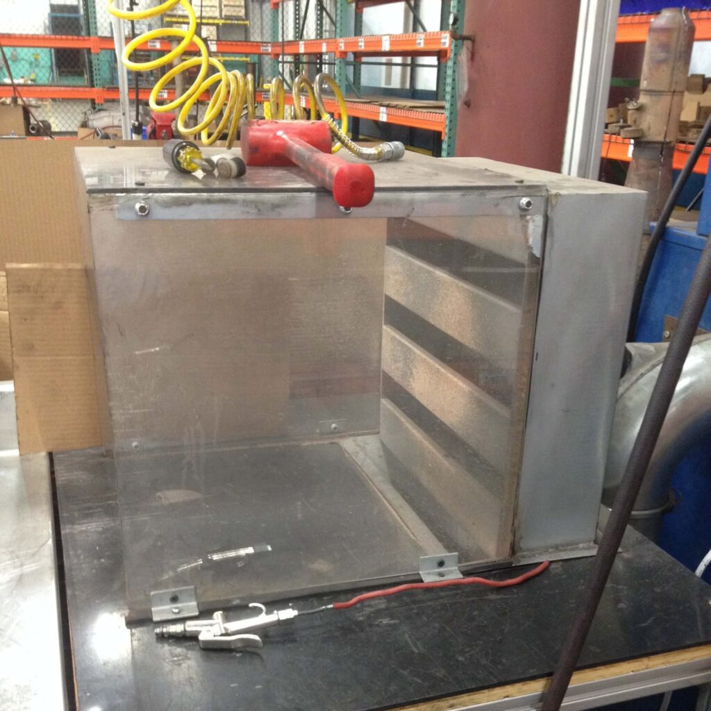 Backdraft hood on a work table