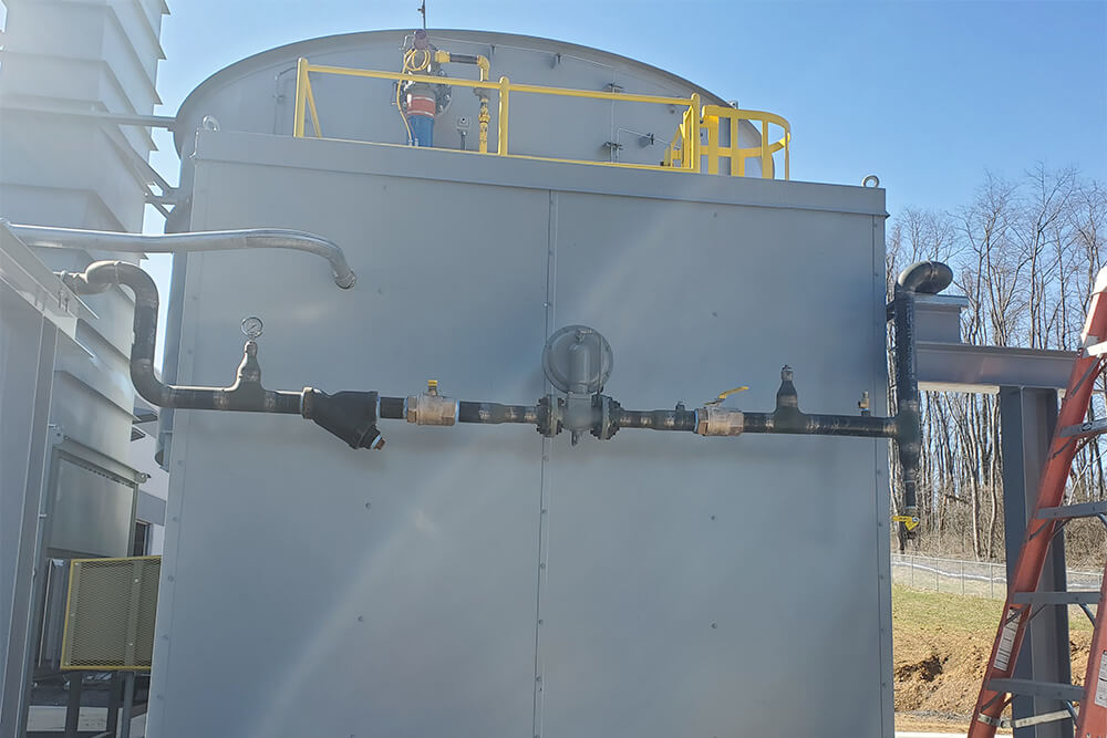 Completed process piping designed and installed outside a building