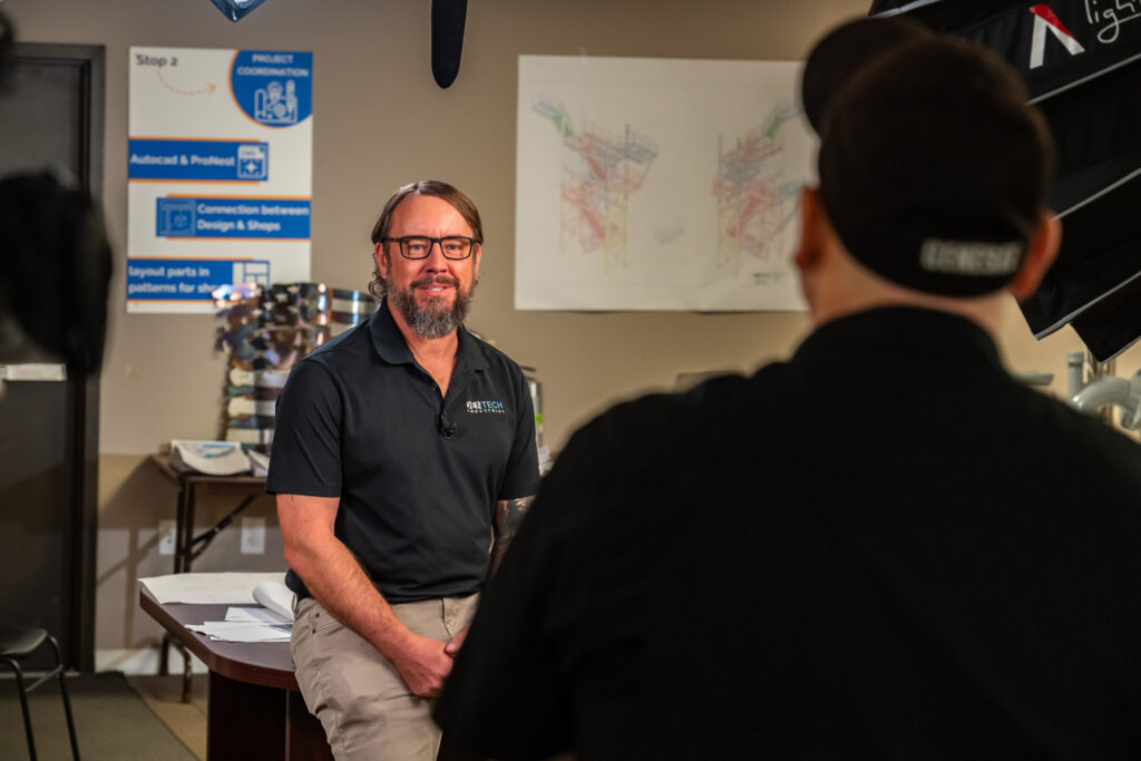 A man is being interviewed on camera