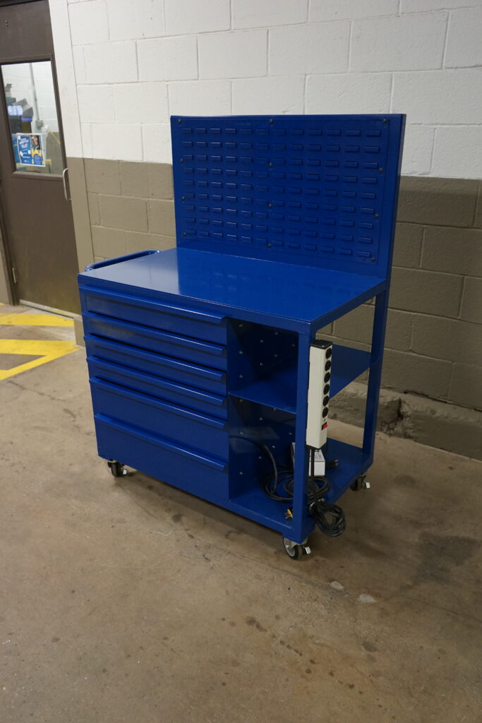 Angled view of blue work cart